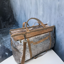 Load image into Gallery viewer, Chocolate &amp; White Brindle Cowhide Duffle Bag

